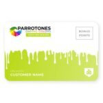 A loyalty rewards card for 'Parrotones Daring Colors Waste-Free Rewards.' The card features a white top section transitioning into a vibrant lime green bottom, with white paint drips separating the two. The Parrotones logo, a colorful parrot head, is in the top left. A 'BONUS POINTS' box is in the top right. 'UNLIMITED' and 'CUSTOMER NAME' are displayed in the bottom left, and a white icon resembling a wallet or savings jar is in the bottom right.