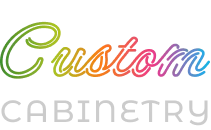 Here are a few options, choose the one that best fits the context (e.g., if it's the main site logo vs. an embedded image): **Option 1 (Concise and Common for Logos):** "Logo for Custom Cabinetry." **Option 2 (More Descriptive):** "Logo displaying 'Custom Cabinetry'. The word 'Custom' is in a colorful, script-like font with a gradient from green to blue, and 'Cabinetry' is in a light gray, all-caps sans-serif font below it." **Option 3 (Slightly shorter descriptive):** "Custom Cabinetry logo with the word 'Custom' in a colorful gradient script and 'Cabinetry' in light gray text below."