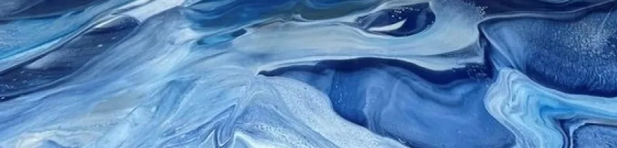 An abstract fluid pattern of swirling light to deep blues and white, resembling marbled paint or flowing water.