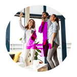 Here are a few options for alt text, depending on the specific context of the image on the website: **Option 1 (General & Descriptive):** ```alt Three people, two women and one man, standing in a bright, modern room. One woman points upwards while the others look in the same direction with interest. ``` **Option 2 (Suggesting Real Estate/Viewing):** ```alt A real estate agent pointing out features to a couple viewing a modern home or apartment. ``` **Option 3 (Suggesting Business/Collaboration):** ```alt Three colleagues or clients observing something overhead in a modern office or collaborative space. ``` **Which one to choose?** * **Use Option 1** if the exact context (real estate, business, etc.) isn't critical or clear. It's the most neutral and descriptive. * **Use Option 2** if the image is on a real estate listing, agent profile, or home design page. * **Use Option 3** if the image is for a business, office solutions, or collaborative workspace page.