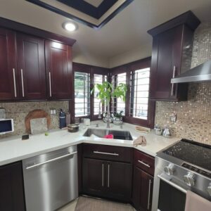 The same kitchen with cherry cabinets