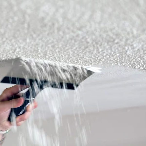 Popcorn ceilings, once popular but now considered outdated and risky due to health hazards like asbestos, can be safely removed and replaced with modern ceiling textures by the professionals at Parrotones.
